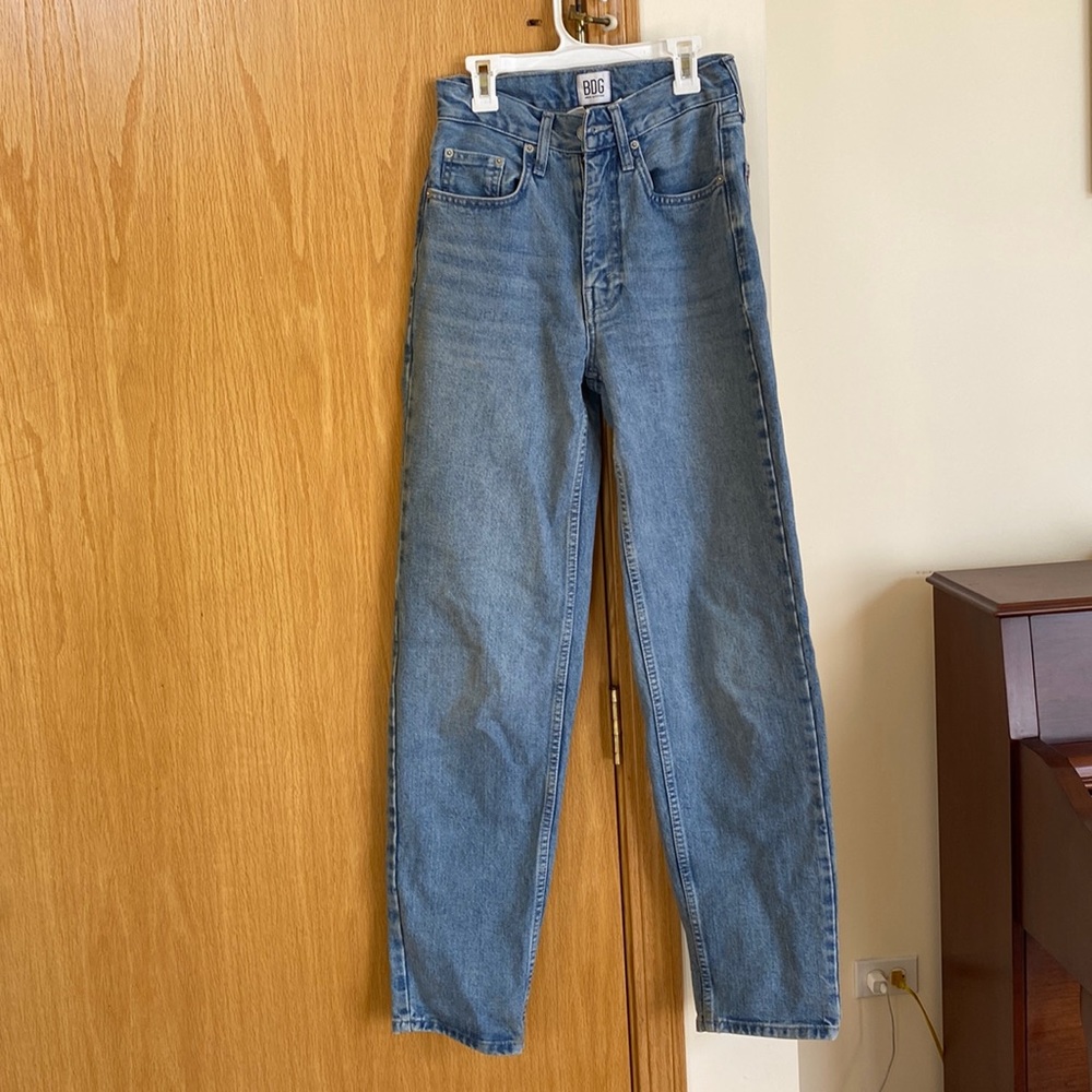 Super flattering, high rise, straight but slightly wide fit blue jeans.